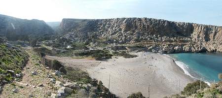 Hadrian in A.D. 123.  The sandy cove at Dyktinna, Rodopos peninsulla, north western Crete. People stood here in the 7th century BC.  Britomartis. Daughter of Zeus.