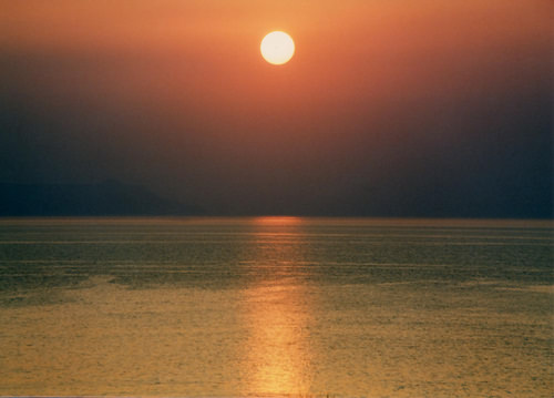 Awe-inspiring early sunrise over Theodorus island, bay of Chania, North West Crete.