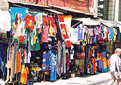 Chania tourist shop, tea-shirts to beach towels, football shirts, hats, summer clothes.